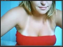 A concupiscent Brazilian blondie in red costume shows it all on webcam
